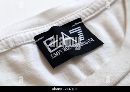 Label of an EA7 EMPORIO ARMANI t-shirt. EA7 is an Italian luxury
