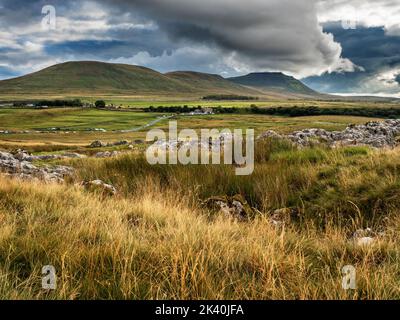 Dramatic clouds over Park Fell, Simon Fell and Ingleborough from Ribblehead in the Yorkshire Dales North Yorkshire England Stock Photo