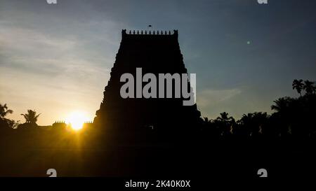 silhouette of a temple castle tower early in the morning during sunrise Stock Photo