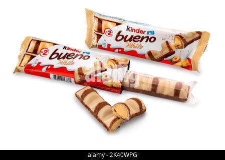 Alba, Italy - September 28, 2022: Kinder Bueno White, wafer covered with white chocolate and cocoa nibs, filled with hazelnut cream. It is a Ferrero b Stock Photo