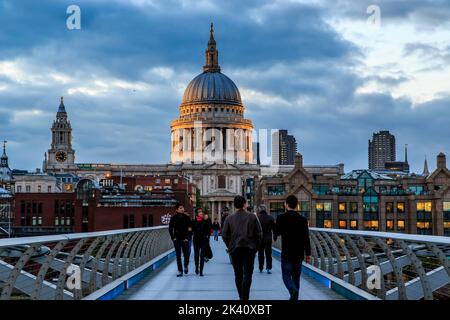 LONDON, GREAT BRITAIN - MAY 11, 2014: It is a view of St. Paul's Cathedral from the Millennium Bridge on a cloudy spring evening. Stock Photo