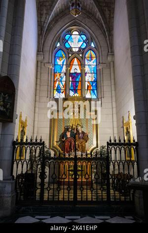 Spain, Madrid. Cathedral of Almudena. Side Chapel and Modern Stained Glass Window. Stock Photo