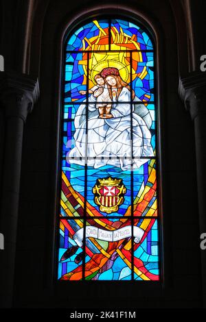 Spain, Madrid. Cathedral of Almudena. Stained-glass Window Showing Mary the Virgin of Mercy. Stock Photo