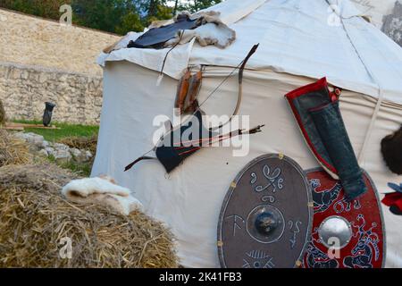 Medieval archer long bow with arrows and quiver Stock Photo
