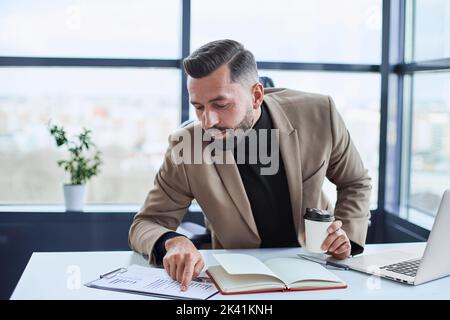 businessman analyzing a financial document. close up. Stock Photo