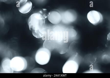 Blurred lights, gray, deep blue background. Abstract bokeh with soft light Stock Photo