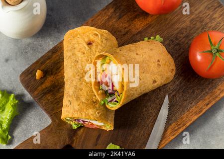 Homemade Fried Chicken Wrap with Lettuce and Tomato Stock Photo