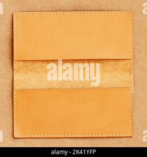 Close-up of opened leather wallet, purse on wooden surface Stock Photo