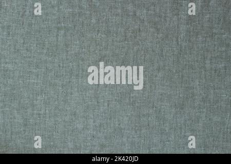 Natural linen background. Gray, pale green color dyed linen organic eco textiles canvas background. Top view Stock Photo