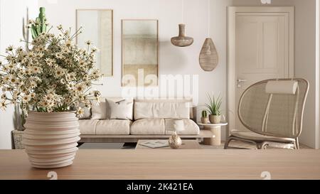 Wooden table top or shelf with pottery vase with daisies, wild flowers, over wooden living room with sofa, armchair, pendant lamp and potted plants, m Stock Photo