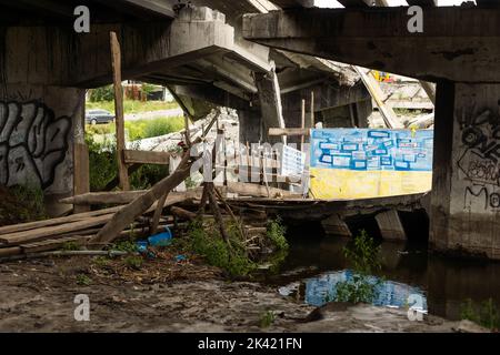 Irpin, Kyiv region, Ukraine - August 21. 2022: A bridge destroyed by the Ukrainian Armed Forces near the town of Irpen to stop the passage of troops Stock Photo