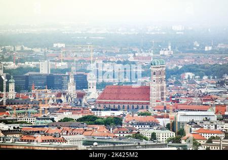 Panoramic view of Cathedral church (called Frauenkirche) landmark and symbol of Munich. Landscape of old city. Bavaria, Germany, September 2021 Stock Photo