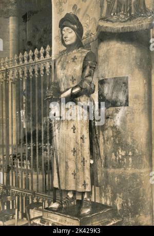 Joan of Arc at the coronation of Charles VII, statue by French artist Prosper d'Epinay, Cathedral of Reims, France 1940s Stock Photo