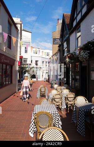 'The Lanes' area of Brighton, specifically Market St / Market Street, Brighton. BN1 1HH. The Lanes is a fashionable and smart district of Brighton, popular with locals and visitors alike because of its restaurants Cafes and boutiques among other shops and businesses. Stock Photo
