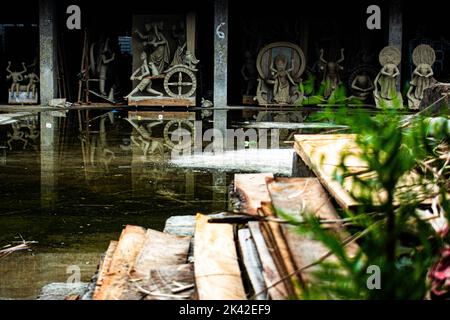 Making idol of goddess Durga in idol making factory as part of Durga Puja festival, the biggest Hindu religious festival in Bangladesh and India Stock Photo