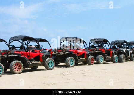 ATV's lined up in the desert, Aruba Stock Photo