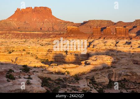 The Chocolate Drops & Elaterite Butte in the Land of Standing Rocks in the Maze District of Canyonlands National Park, Utah.  In the foreground is a m Stock Photo