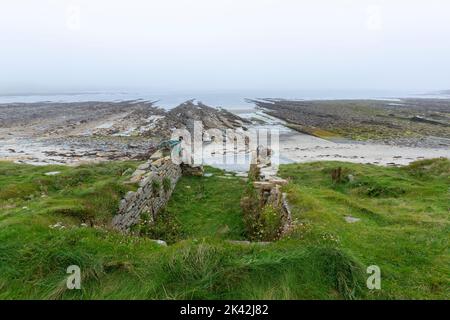 Ruined stone fisher shelter in Brough of Birsay, The Mainland of Orkney, Scotland, UK Stock Photo