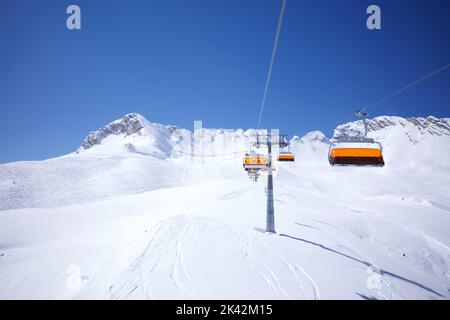 Ski piste and chairlifts on Zugspitze, the only glacier ski area in Germany. Stock Photo