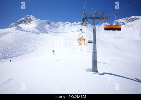 Ski piste and chairlifts on Zugspitze, the only glacier ski area in Germany. Stock Photo