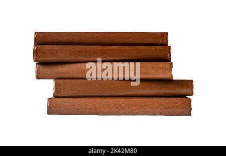 Abstract books stack spines. Classic brown literature isolated on white background. High quality photo Stock Photo