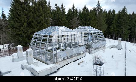 Greenhouse station snow winter frost open top chambers climate change science research Bily Kriz, plant spruce Picea abies Norway European mountain Stock Photo