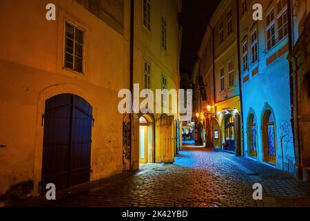 PRAGUE, CZECH REPUBLIC - MARCH 04, 2022: Walk in Stare Mesto district in maze of narrow medieval streets, occupied with cafes, restaurants and souveni Stock Photo