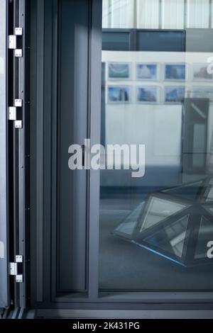 large metal window in a modern home interior design. Stock Photo