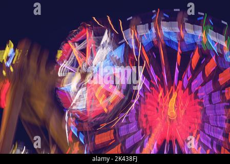 Abstract long exposure colorful lights background at night photo Stock Photo