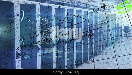 Image of data processing and stagflation text over server room Stock Photo
