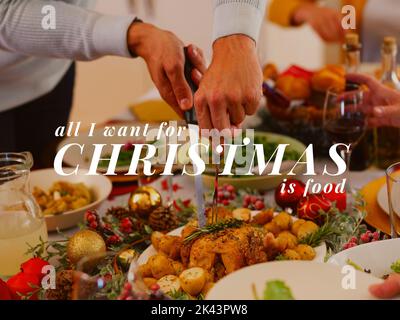 Composition of christmas text over caucasian man carving turkey on christmas table Stock Photo