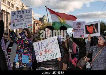 Dublin, Ireland. 28th Sep, 2022. Protesters hold placards expressing their opinion during the demonstration. The death of Mahsa Amini inspired protesters to gather in Dublin's city center to call for the freedom of Iranian women and to protest against the Iranian government. Around the world and in Iran, a significant number of people have been protesting, and since the demonstrations started, 41 people have been reported killed in Iran. Credit: SOPA Images Limited/Alamy Live News Stock Photo