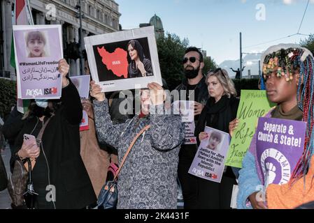 Dublin, Ireland. 28th Sep, 2022. Protesters hold placards expressing their opinion during the demonstration. The death of Mahsa Amini inspired protesters to gather in Dublin's city center to call for the freedom of Iranian women and to protest against the Iranian government. Around the world and in Iran, a significant number of people have been protesting, and since the demonstrations started, 41 people have been reported killed in Iran. Credit: SOPA Images Limited/Alamy Live News Stock Photo