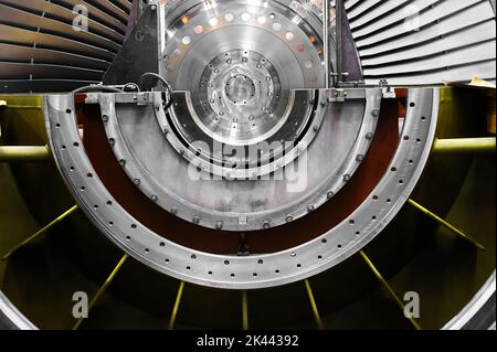 A powerful steam turbine rotor is installed in the lodgment of the steam turbine base. Stock Photo