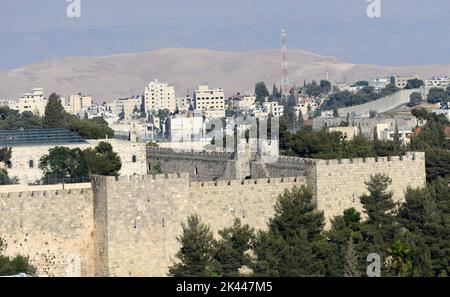 A view of the old city in Jerusalem with the Judean desert and Jordanian mountains in the background. Stock Photo