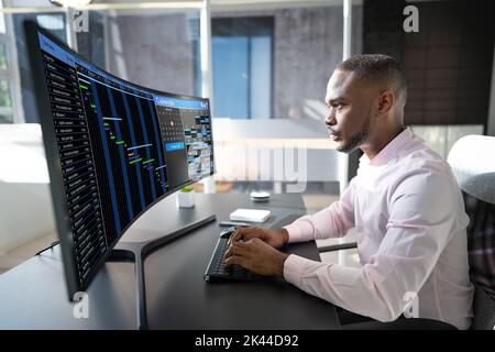 Man Working On Calendar Agenda Schedule On Computer Stock Photo