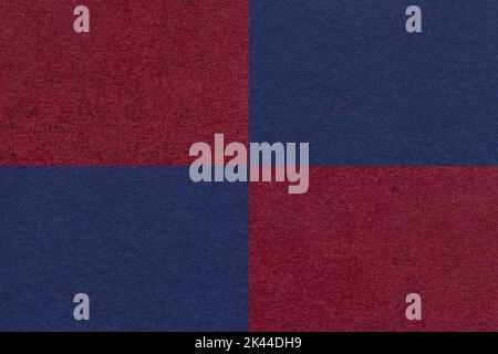 Texture of craft navy blue and dark red paper background with cells pattern, macro. Structure of vintage dense kraft wine cardboard. Felt abstract che Stock Photo
