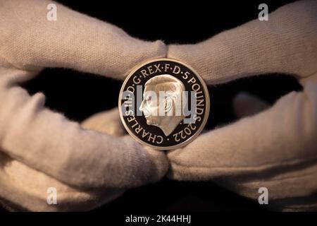 The Royal Mint unveils coin effigy of His Majesty King Charles III, designed by Martin Jennings. The King's portrait will first appear on a £5 and a 50p commemorating the life and legacy of Her Late Majesty Queen Elizabeth II. 29th September 2022. Worshipful Company of Cutlers Hall, London. Credit: Jeff Gilbert/Alamy Live News Stock Photo