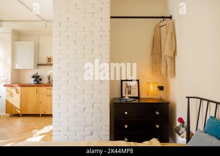 Interior of stylish and sunny studio apartment Stock Photo