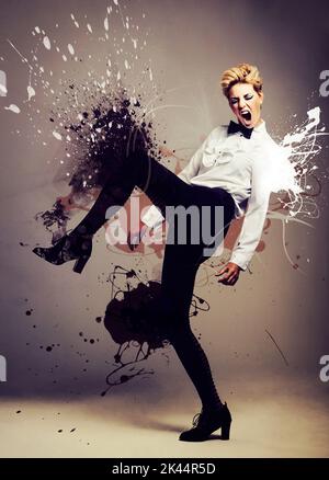 Making a splash. Studio shot of a fashion model that is digitally enhanced. Stock Photo