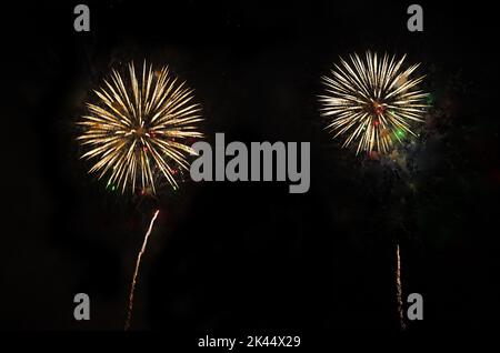Two fireworks on night sky Stock Photo