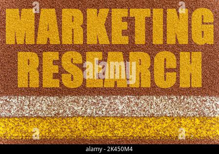 Business and finance concept. On the treadmill, lines and an inscription - MARKETING RESEARCH Stock Photo