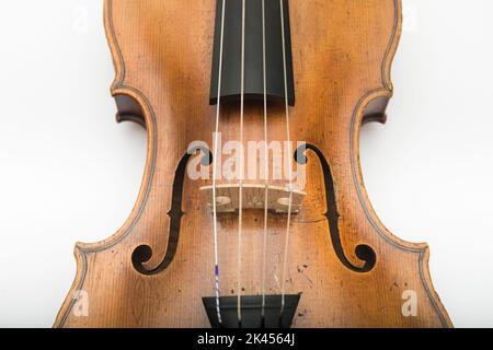 Close up of violin bridge with f-holes. Stock Photo