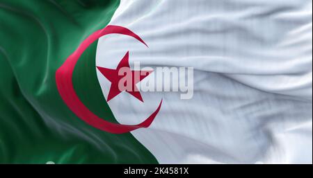 Close-up view of the Algeria national flag waving in the wind. People Democratic Republic of Algeria, is a country in North Africa. Fabric textured ba Stock Photo