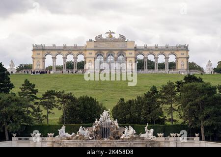 Schloss Schönbrunn with Neptunbrunnen and Gloriette in Background in Vienna, Austria Stock Photo