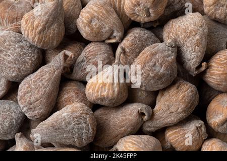 Sweet dried small spanish figs close up full frame as background Stock Photo