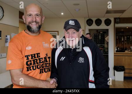 Selkirk, UK. 30th Sep, 2022. Tim Tunnicliff meets Bert Duffy, Selkirk RFC stalwart and former President of the Scottish Rugby Union, at Selkirk on Day 24 - Gala RFC to JedForest RFC. The Great Rugger Run 2022 taking place in Scotland between September 7th and October 1st, 2022. The route will take in the West Highlands, Glasgow, Ayrshire, Stirling, Dundee, Edinburgh and finishing in The Borders C Over 500 miles in 25 days! Credit: Rob Gray/Alamy Live News Stock Photo