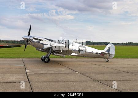 Supermarine Spitfire Mk IX, known as the ' Silver Spitfire ', a vintage World War 2 plane, seen on the ground at the Imperial War Museum Duxford UK Stock Photo