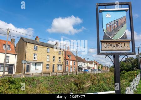 Village sign, New Road, Upwell, Norfolk, England, United Kingdom Stock Photo