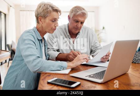 Communication, discussion and couple with paperwork planning financial strategy budget plan. Senior man and woman with documents review finance Stock Photo